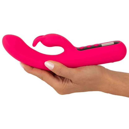Hand hält den Pink Sunset Rabbit Vibrator