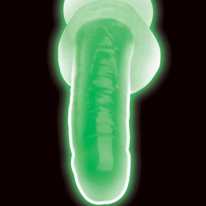 Grüner Glow in the Dark Dildo im dunkeln