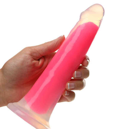 Pinker Dildo "Glow in the Dark" in Frauenhand